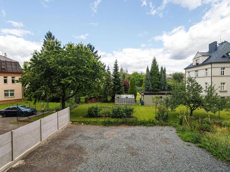 Garden and parking area behind the building